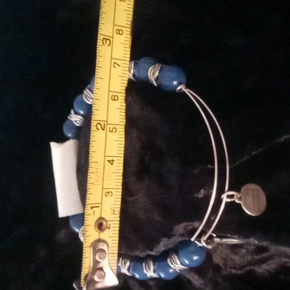Alex and Ani bangles bracelet blue beaded with a Celtic knot design bead. - Picture 5 of 6